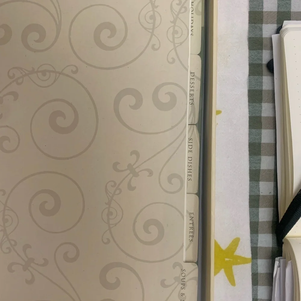 Family Recipes Cookbook with Black, White, and Cream Cover